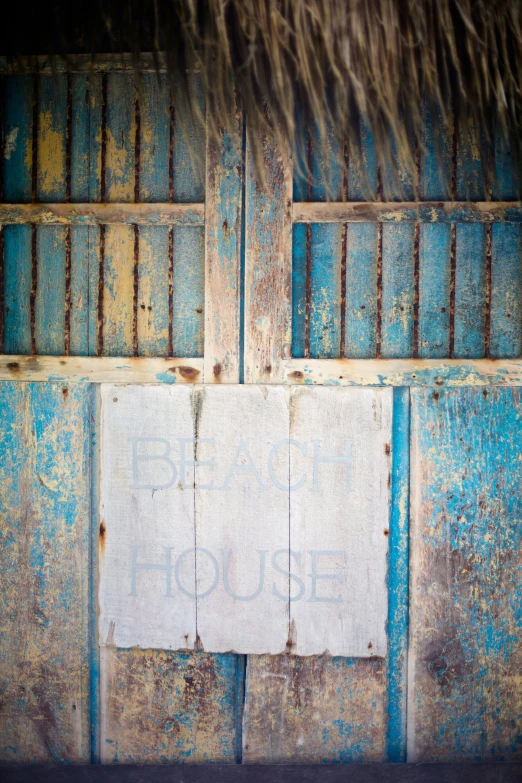 a sign is posted on the side of a building