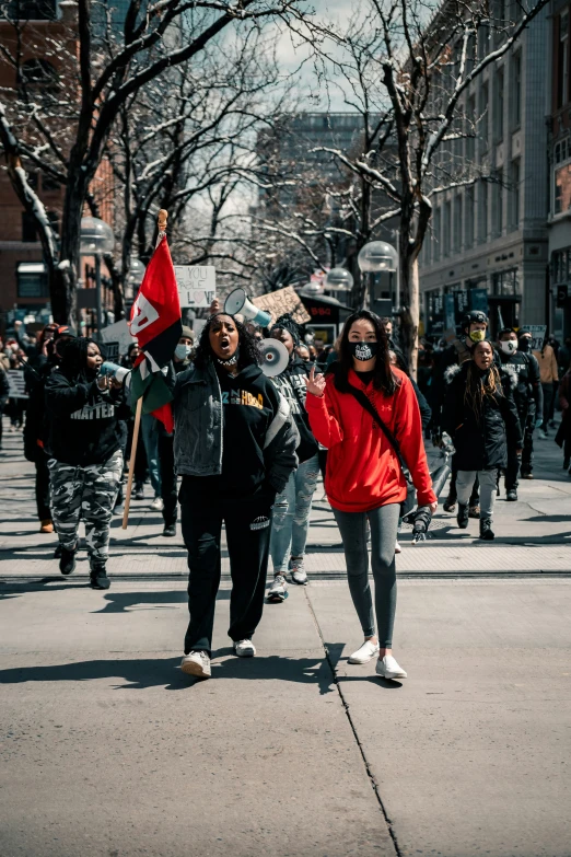 people in a city street on a clear day