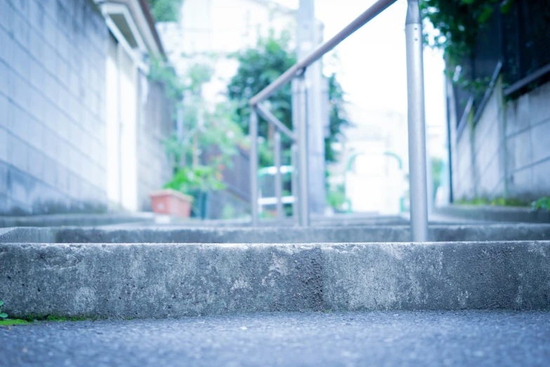 a stop sign sitting in the middle of stairs