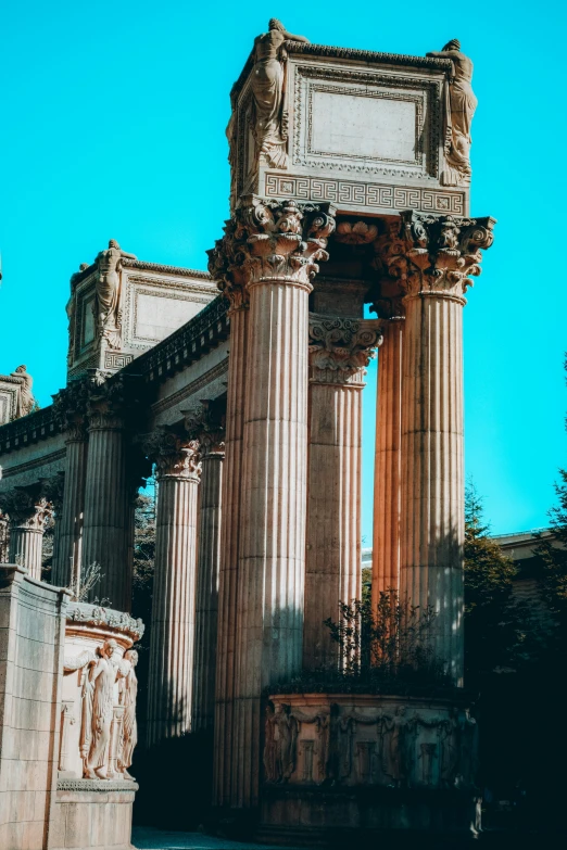 the large stone pillar with two different columns