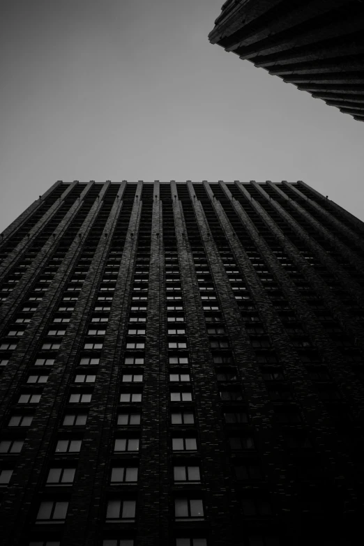 an upward view of a very tall building