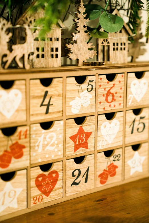 boxes holding different kinds of heart shaped numbers and houses