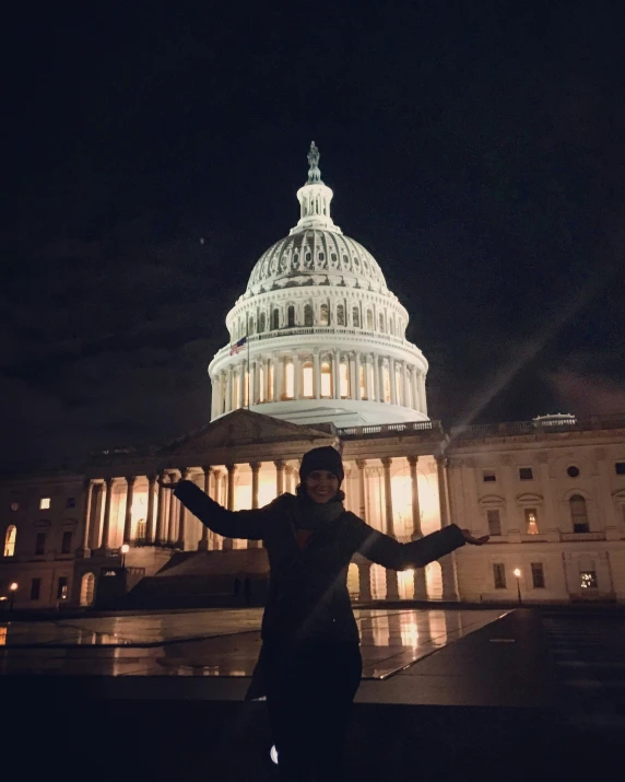 man on a skateboard in front of the capitol building