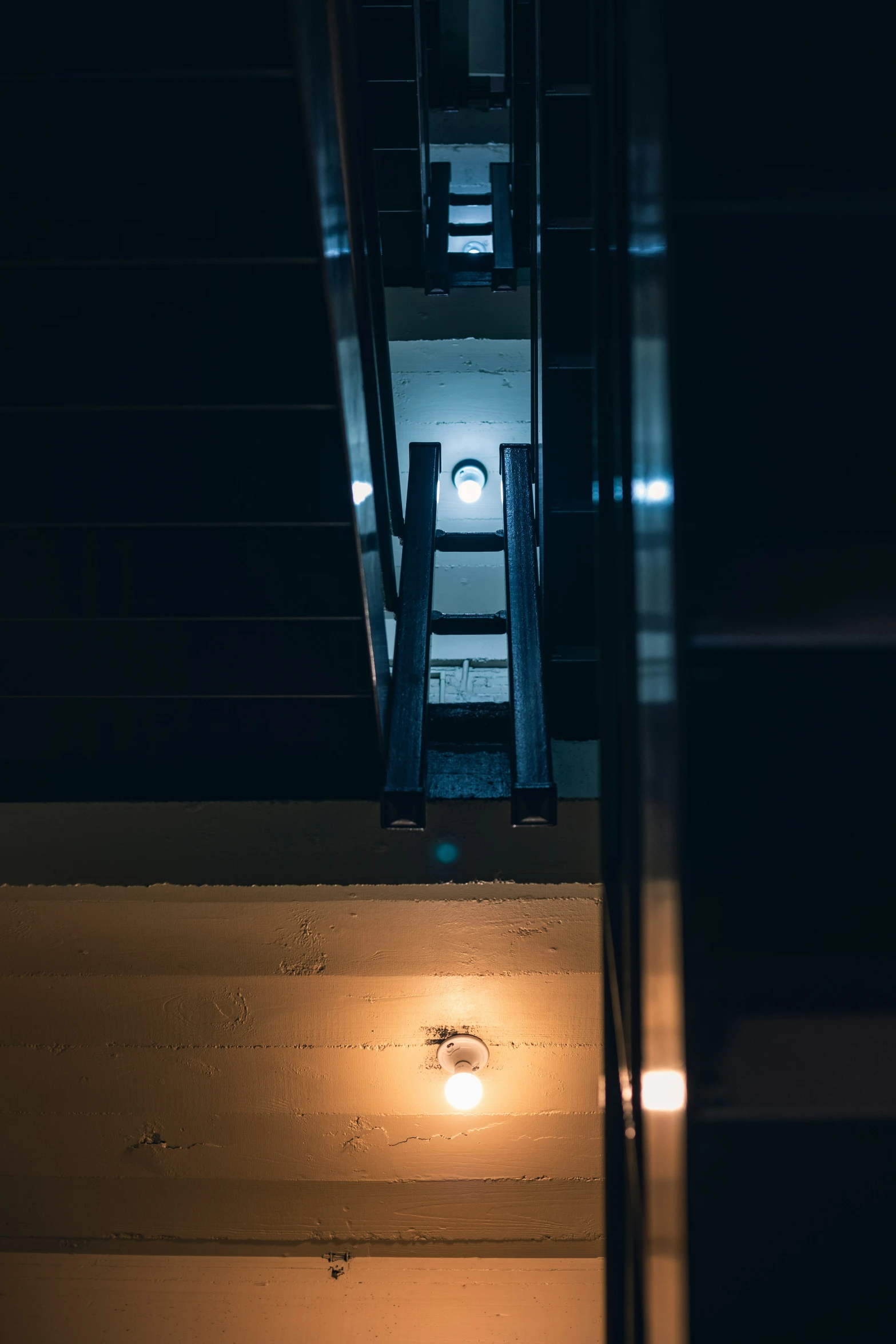 the doorway to an outside stairwell at night time