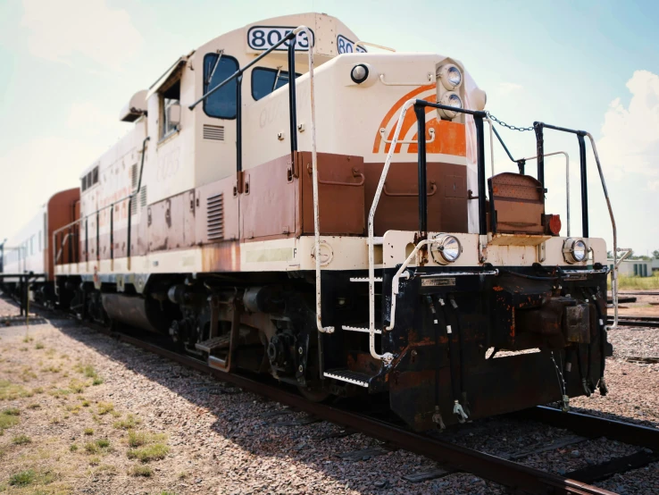 a train sits empty at the end of the tracks