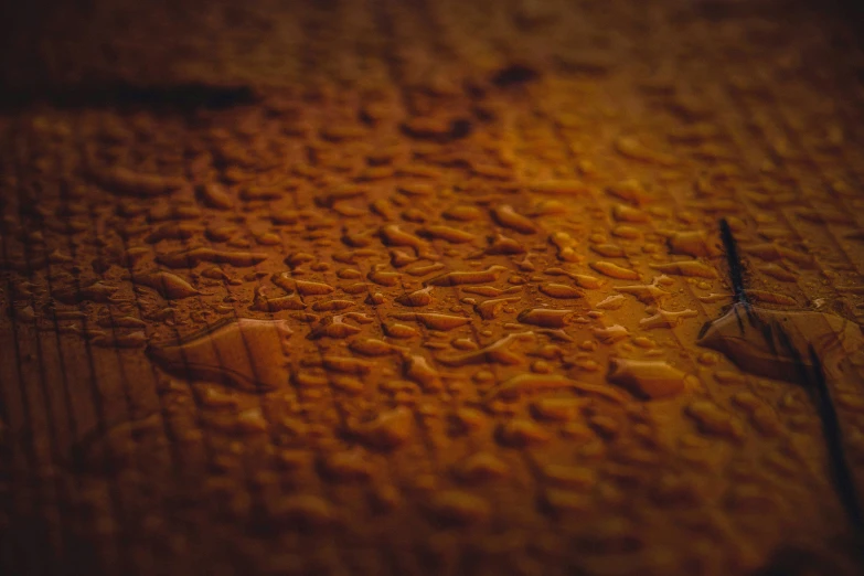 an orange wooden surface is being pographed