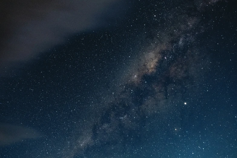 the starry night sky, viewed from the ground with no clouds