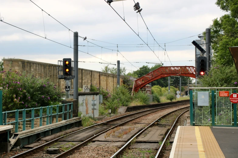 there is a red light on the railroad