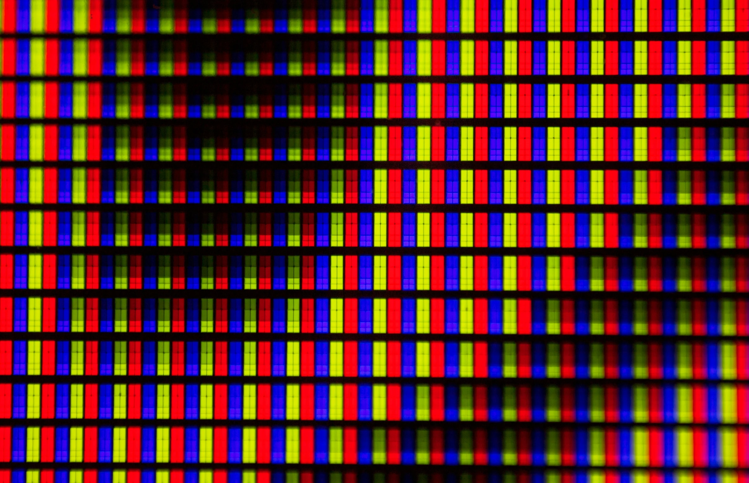 a close up s of colorful stripes with a black background