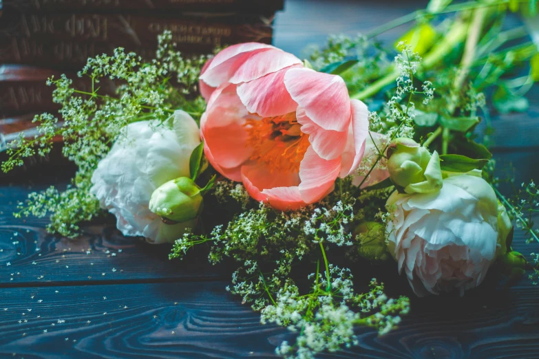 an image of flowers sitting on the floor