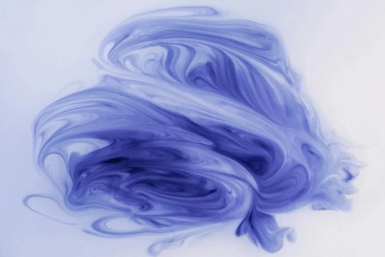 this is a pograph of some liquid that is blue and white