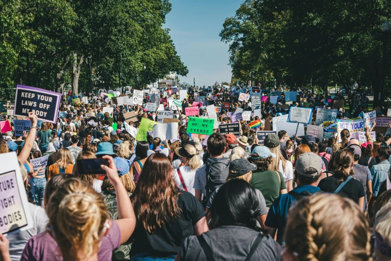 a large group of people gathered outside at an event