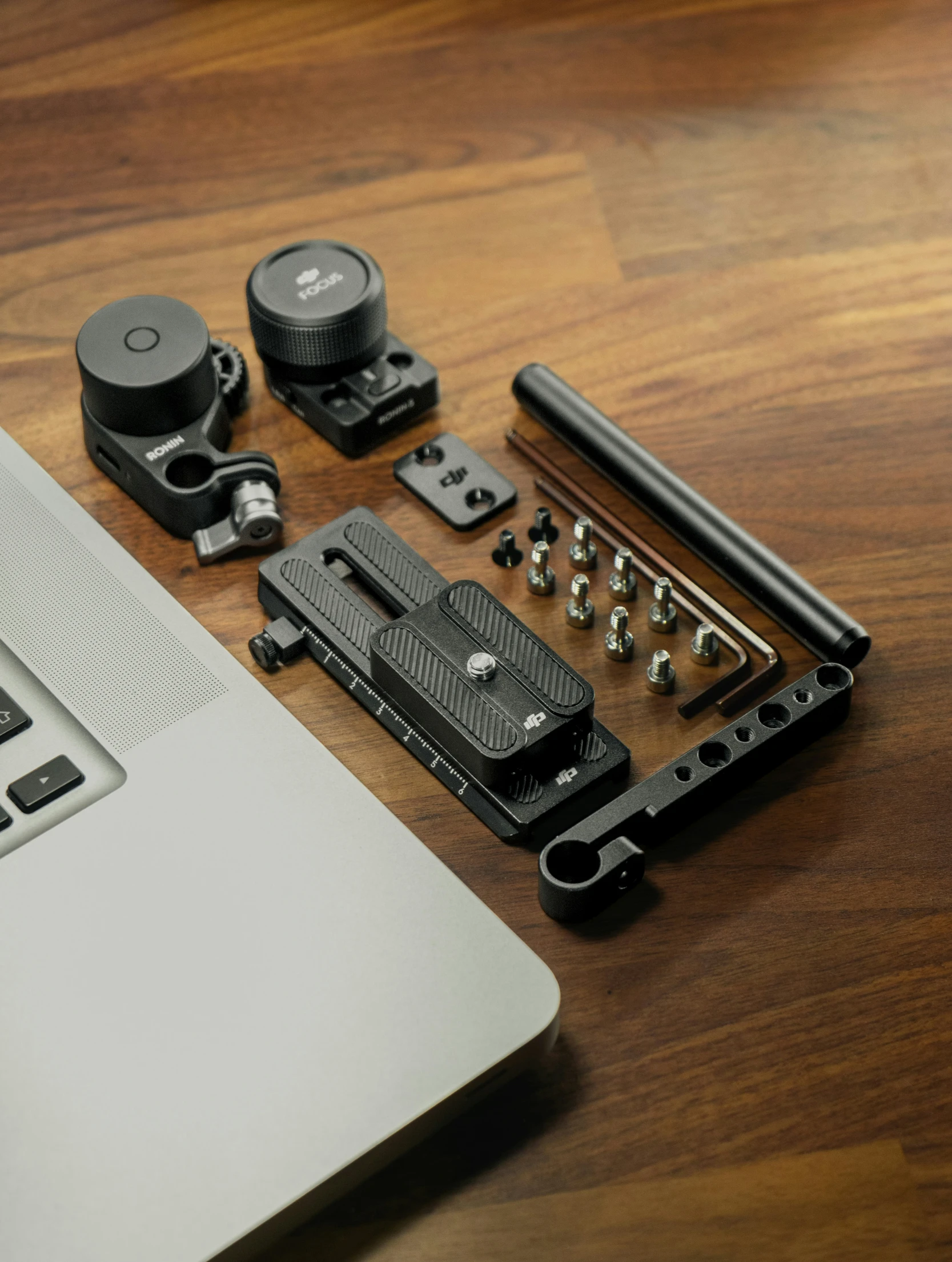 an external keyboard, hardware and key board with a laptop behind it