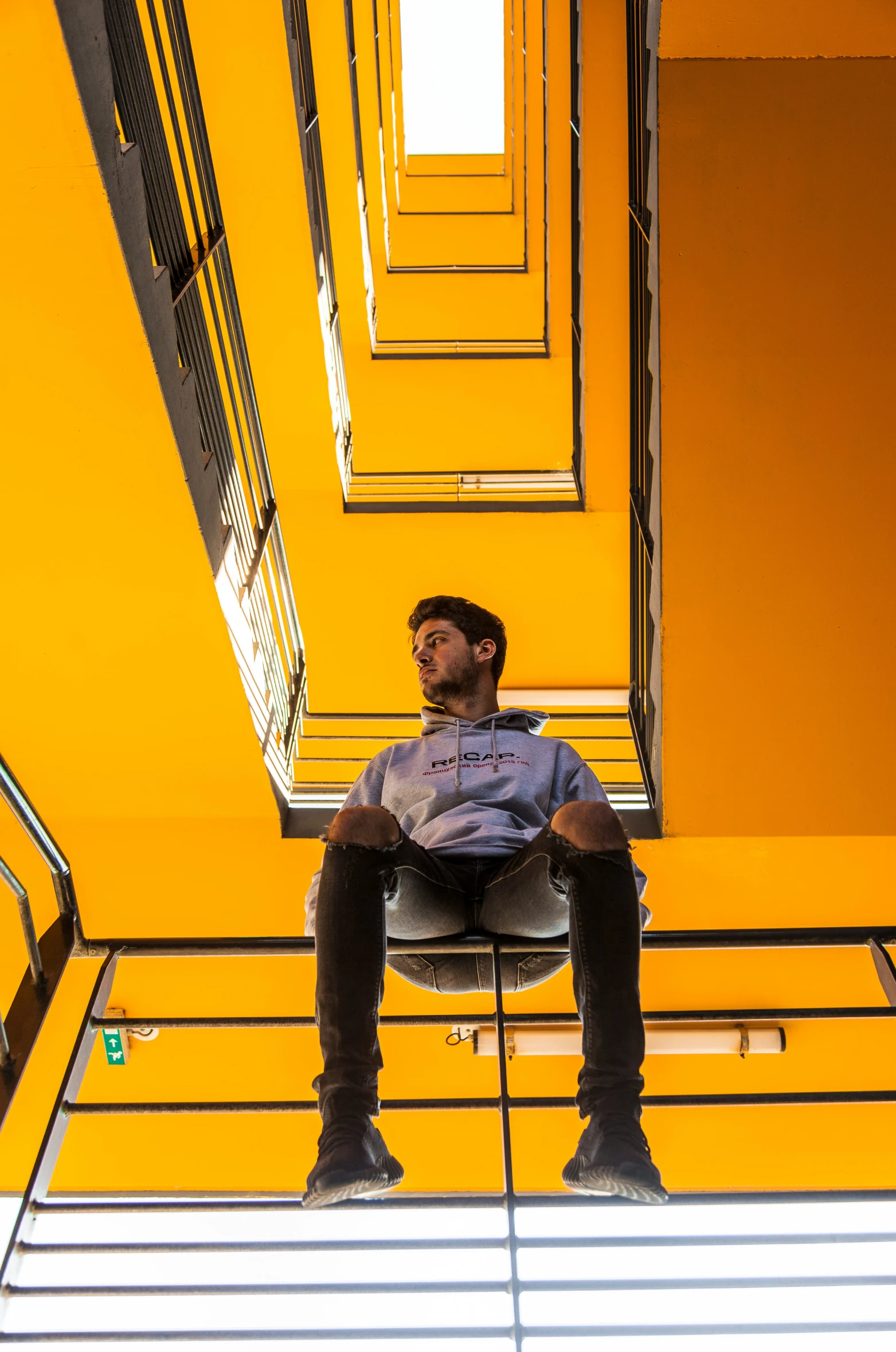 a person sitting on top of a chair