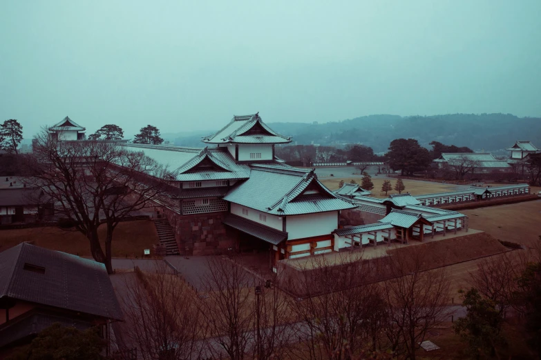 this is a old chinese building on top of a hill