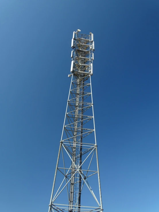 a very tall tower with a clock on top of it