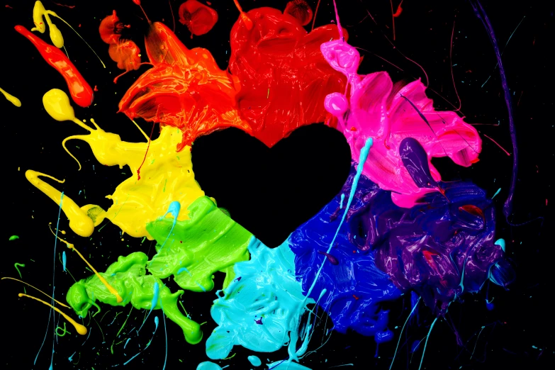 a heart shape in different colors of paint