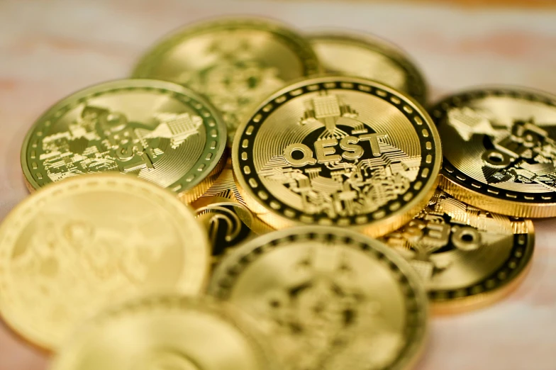 a close up image of a pile of coins