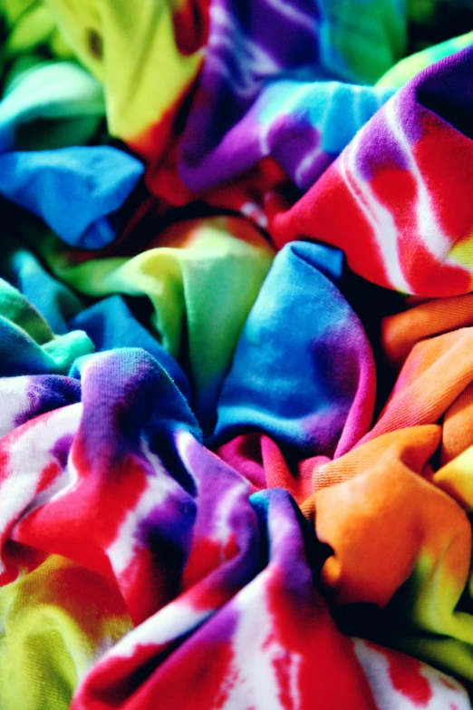 a close up view of several colored clothing