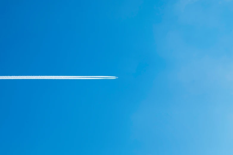 a contrails are seen in the sky above