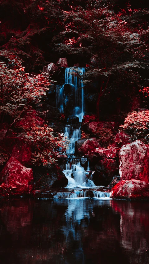 a painting of water and rocks near a stream