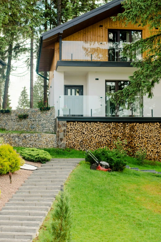 stairs lead up to a nice house in the countryside