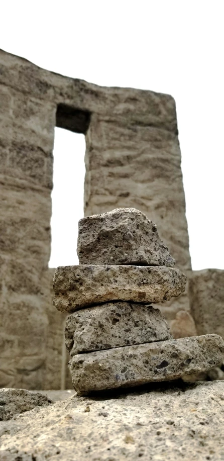 stone stacking in front of a castle ruins window