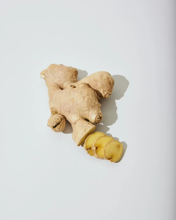 a cut open ginger on the floor