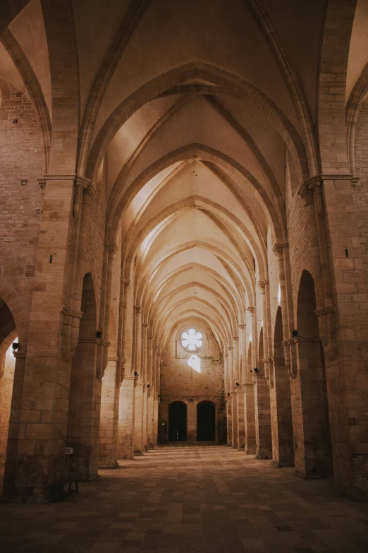 inside a large cathedral with stone arches and arches