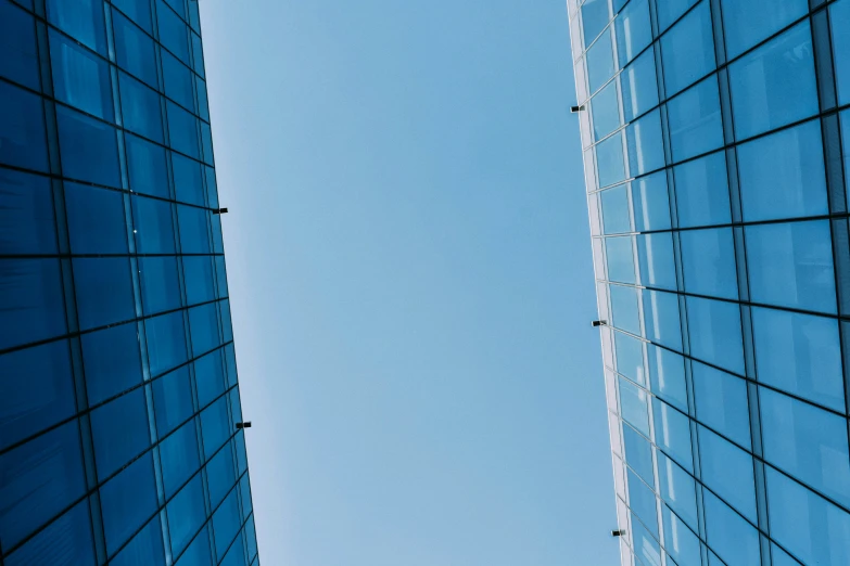 a view of the outside of two tall buildings