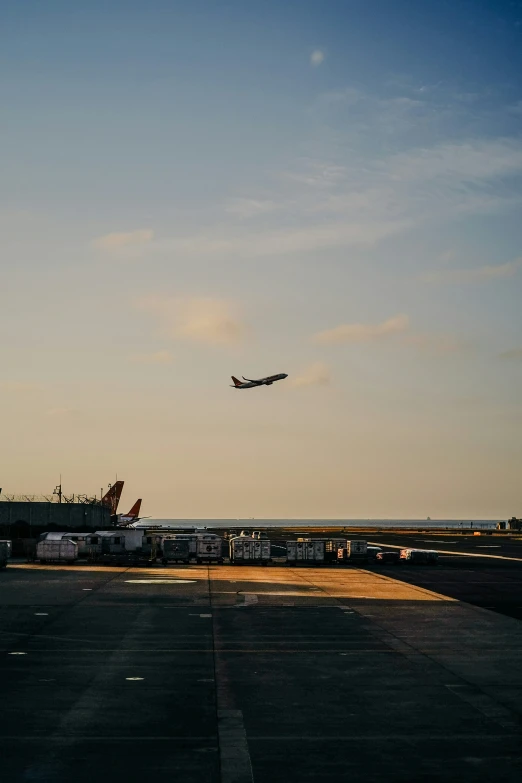 an airplane on the tarmac with a jetway on top