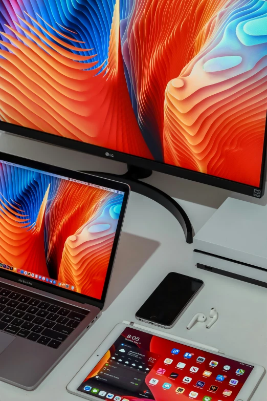 an image of two laptops on the desk with their screens