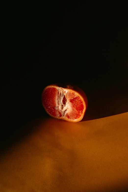 a piece of fruit laying on a table