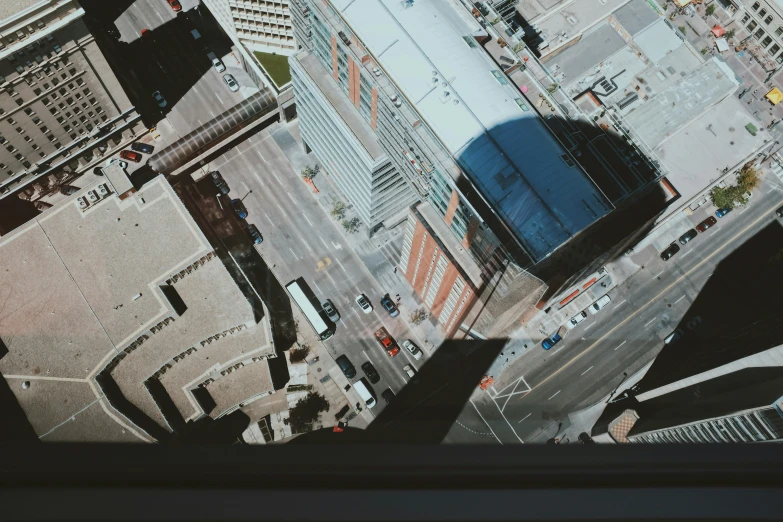 a view from the top of a building overlooking the street