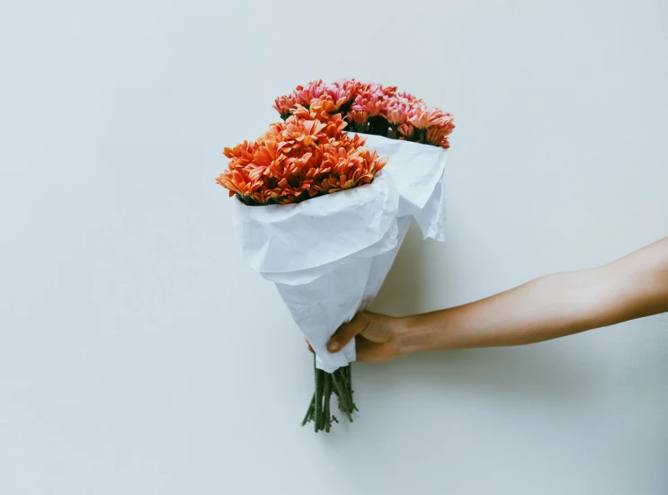 an image of someone giving flowers to someone