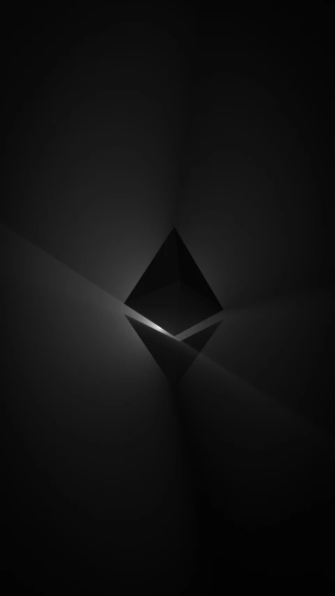 a black and white image of a diamond