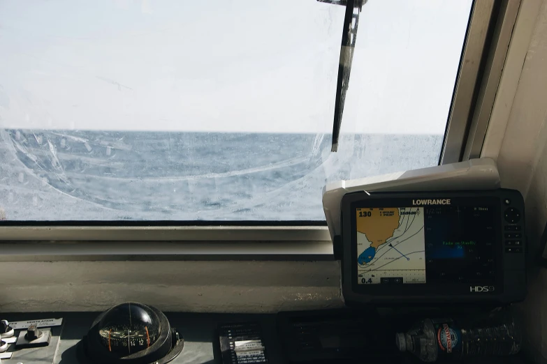 the view out a window over a body of water