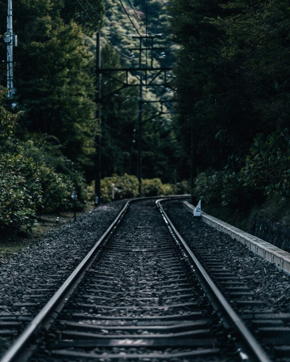 two train tracks are lined beside one another