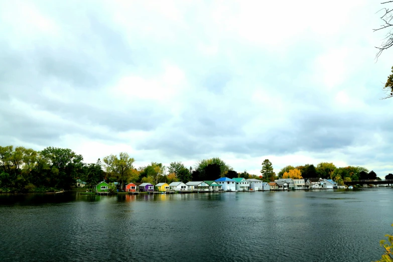 an autumn scene, with a boat in the background