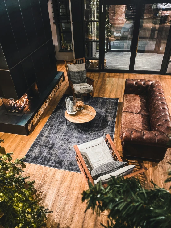 a living room filled with furniture and a fire place