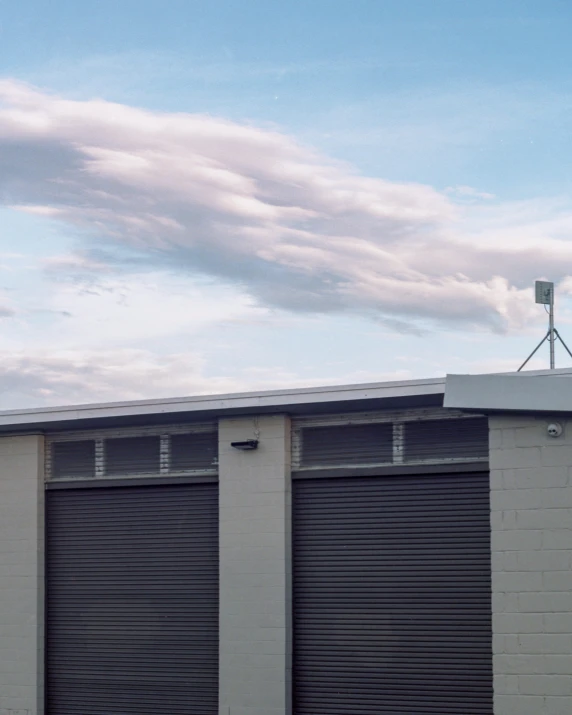 an industrial garage has a security camera on top