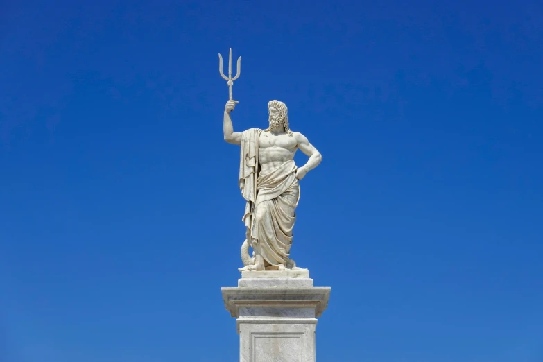 a statue of a woman holding a weapon