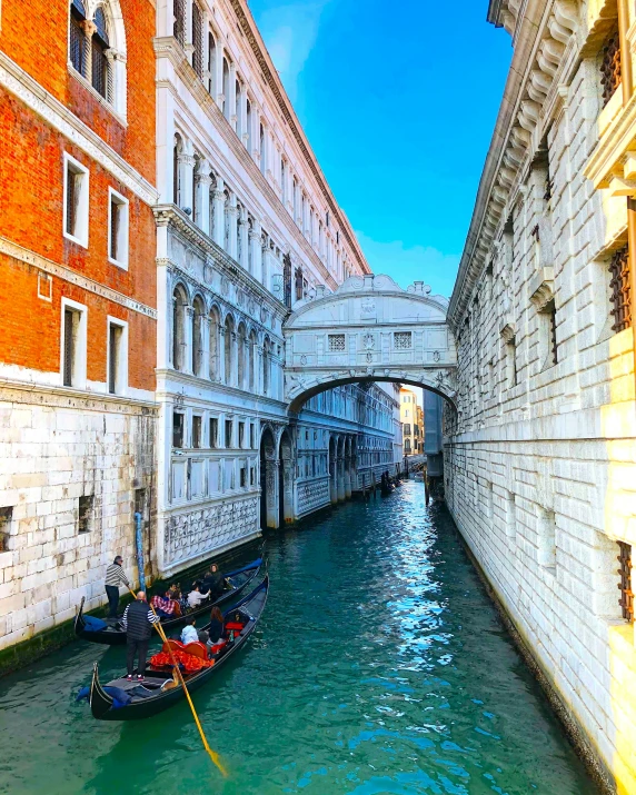 boats are on the river in venice