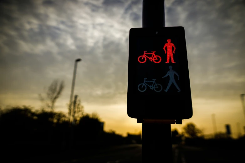 the traffic sign is showing two people walking