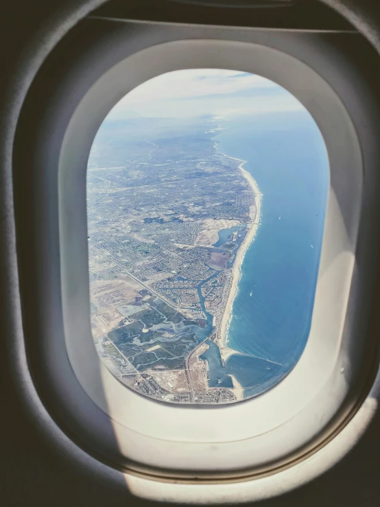 a window that is looking out on an ocean