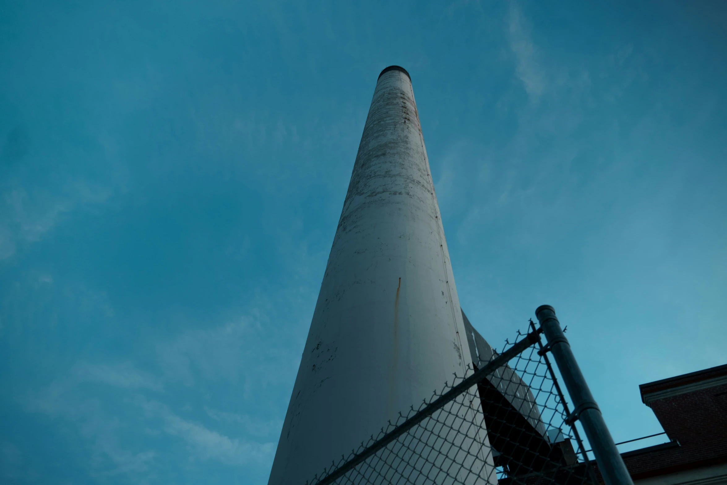 the top of a tall tower in the distance