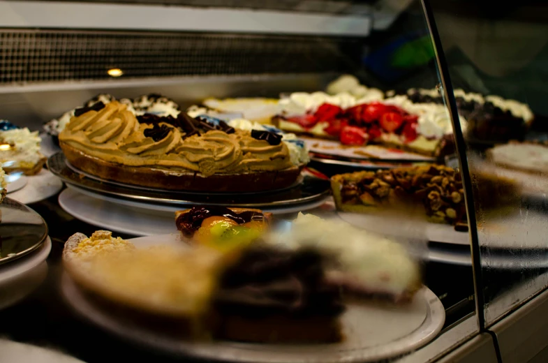 many pies sitting on plates in the baking dish