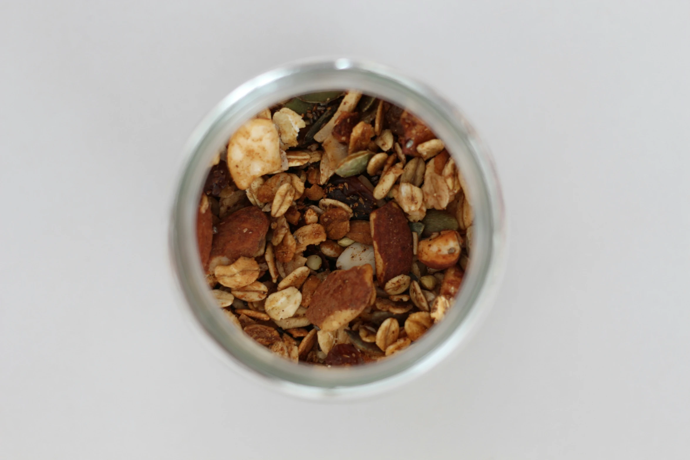 a bowl of cereals and nuts in it