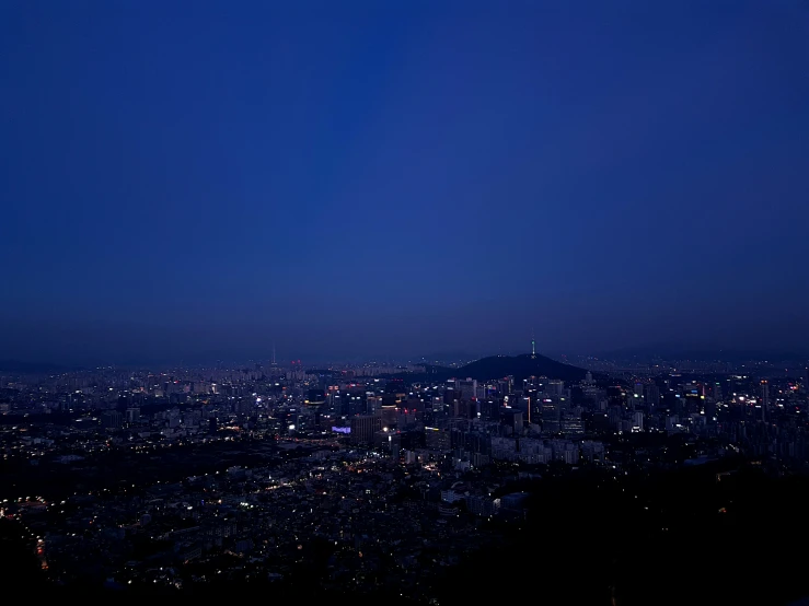 the skyline of a city in the night time