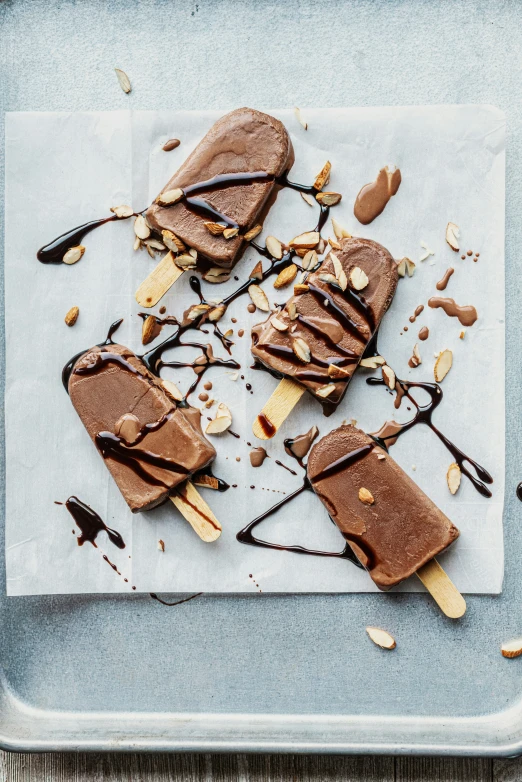 desserts on a square tray covered in chocolate